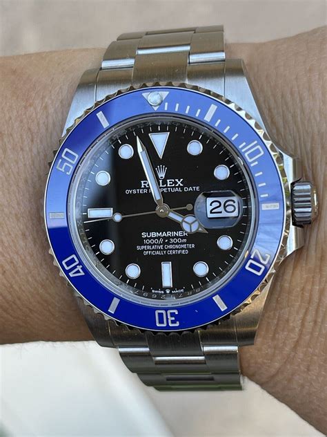 women with watch rolex hand blue|rolex submariner blue bezel.